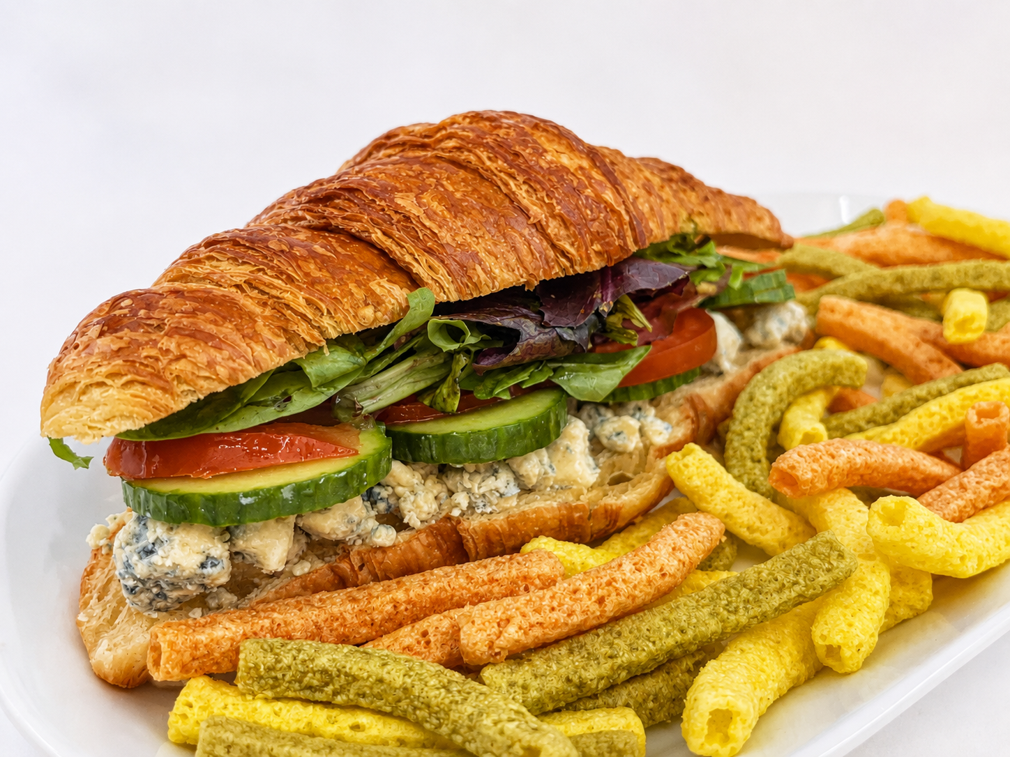 Blue Cheese and Greens Croissant sandwich with veggie straws for fast beach food delivery in Naples Florida