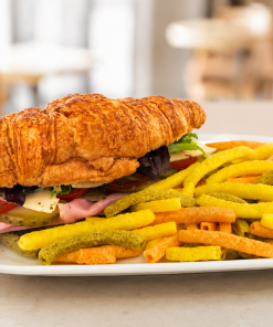 Ham and Swiss Croissant sandwich with veggie straws for fast beach food delivery in Naples Florida